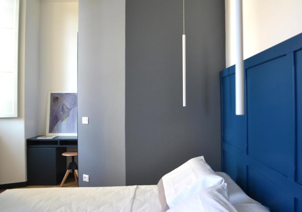 Postel nebo postele na pokoji v ubytování Da Domè Charm Rooms
