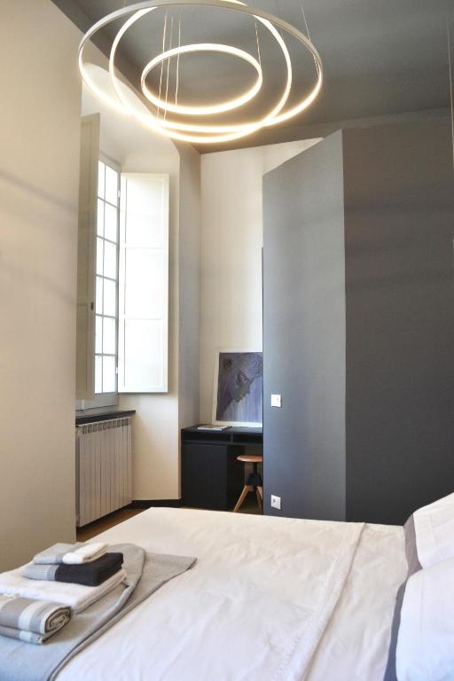 Postel nebo postele na pokoji v ubytování Da Domè Charm Rooms
