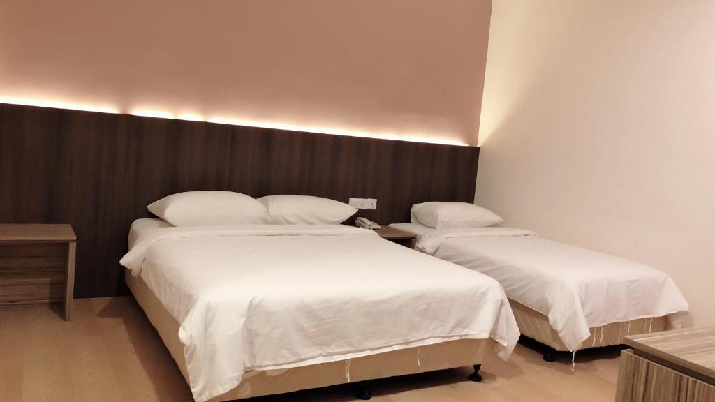 Tumike Hotel Bentong - Superior Dreibettzimmer