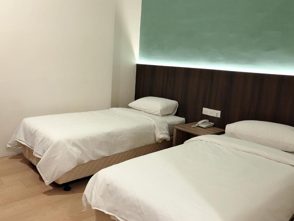 Tumike Hotel Bentong - Standard Zweibettzimmer