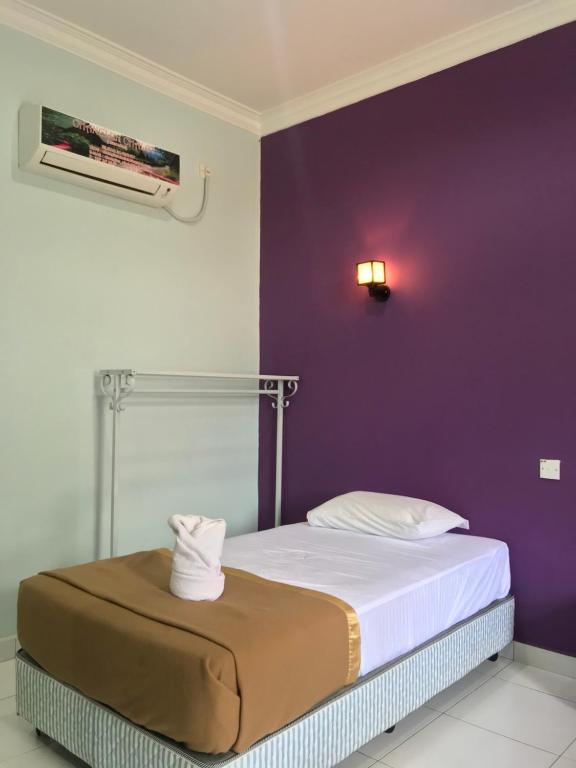 Postel nebo postele na pokoji v ubytování Changlun Chalet
