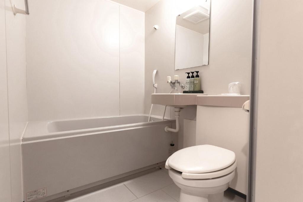 Koupelna v ubytování Tabist Kanko Business Hotel Matsuyama Hida Takayama