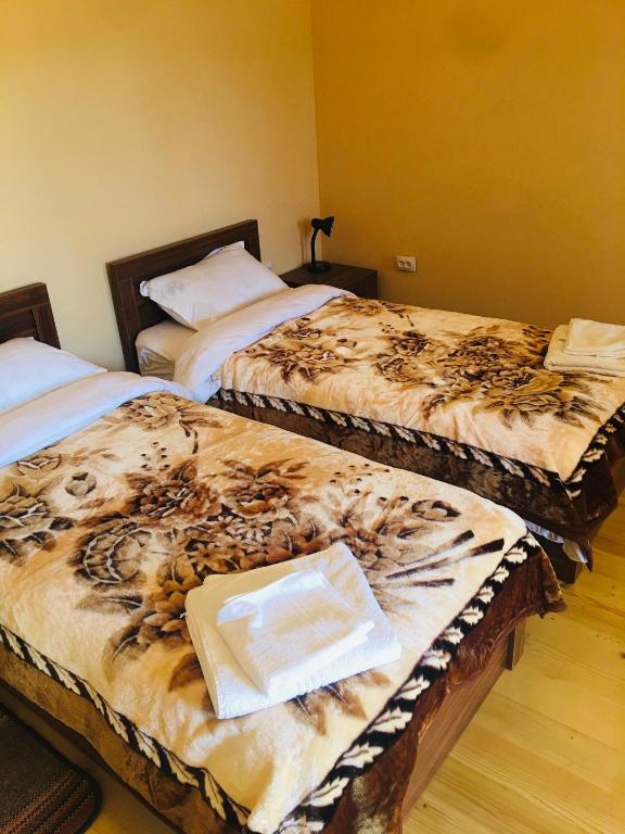 Postel nebo postele na pokoji v ubytování Guesthouse AlpenRose
