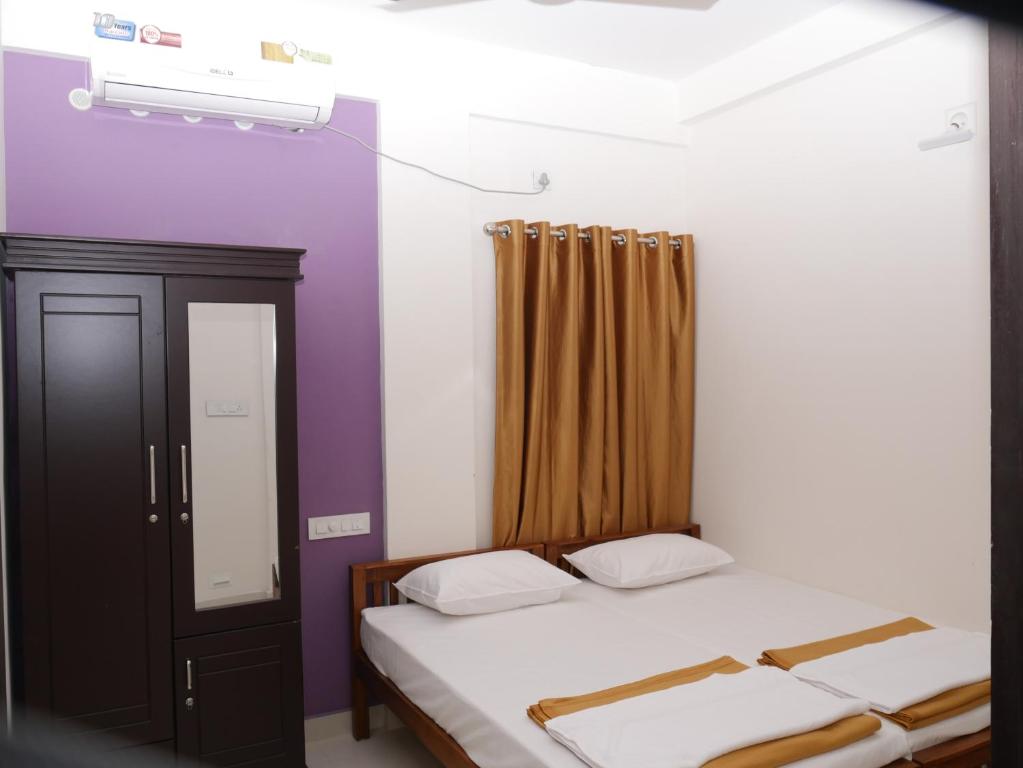 Postel nebo postele na pokoji v ubytování Coral Homes