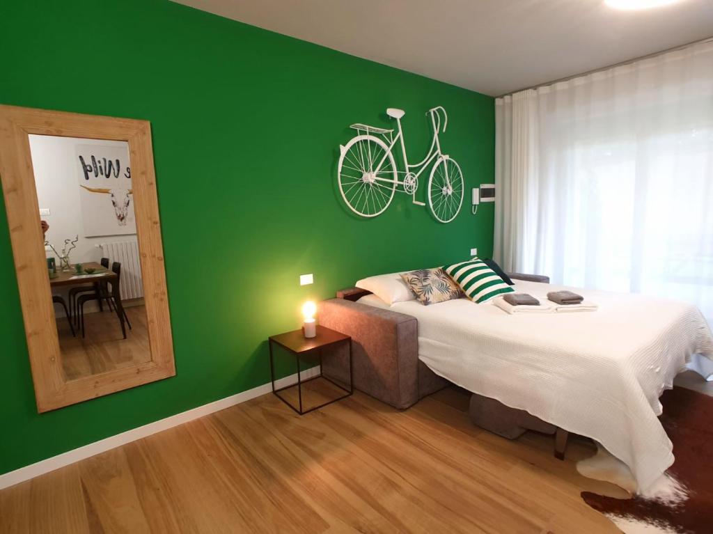 Postel nebo postele na pokoji v ubytování Donizetti Residence