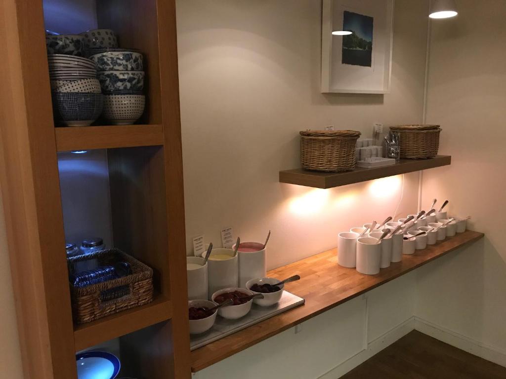 Kuchyň nebo kuchyňský kout v ubytování Port Hotel