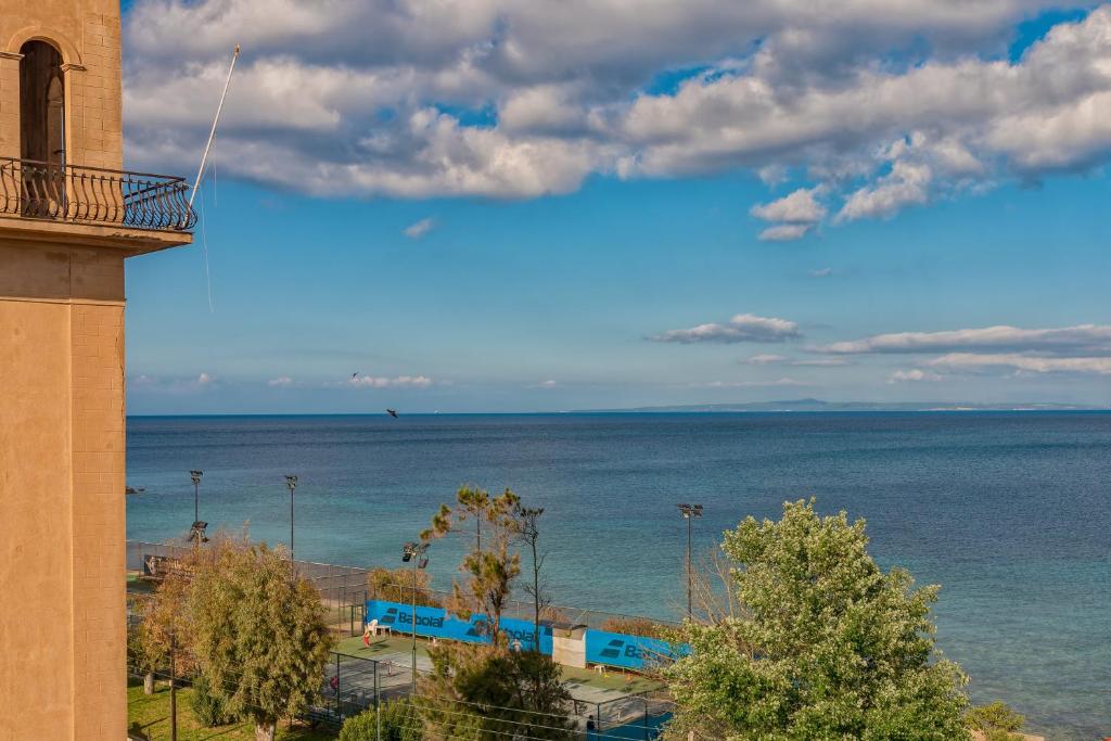 a view of the ocean from a building at Mandy Seafront Studios in Zakynthos