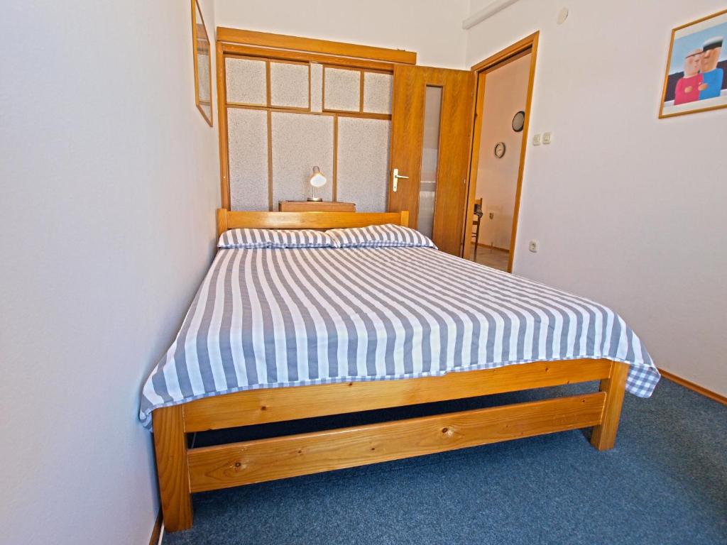Postel nebo postele na pokoji v ubytování Apartment Dusko 780