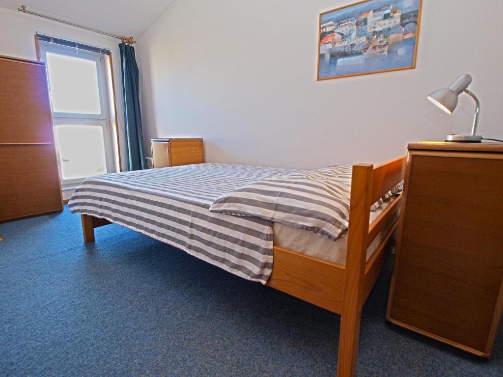 Postel nebo postele na pokoji v ubytování Apartment Dusko 780