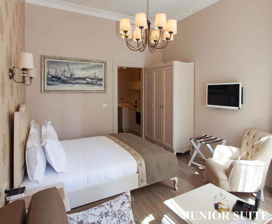 TV a/nebo společenská místnost v ubytování Louis Appartements Galata