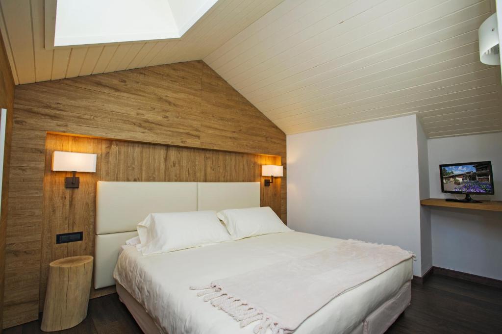 Postel nebo postele na pokoji v ubytování Palace Hotel Wellness & Beauty