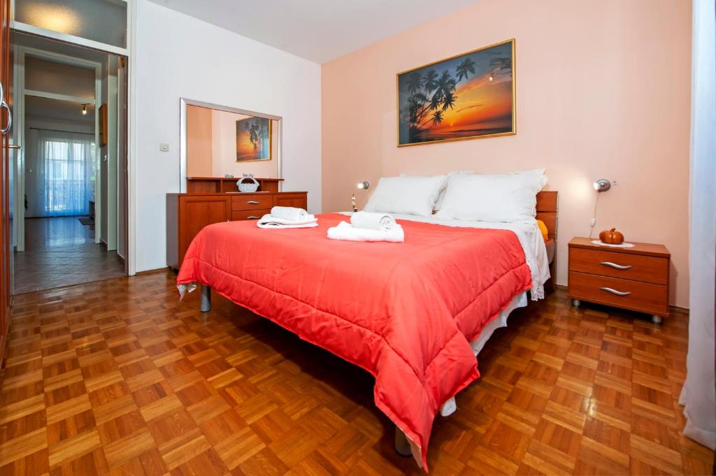 Postel nebo postele na pokoji v ubytování Apartments Ita