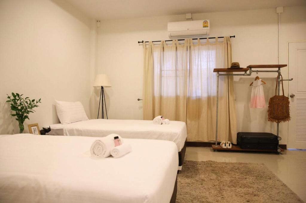 Postel nebo postele na pokoji v ubytování First Residence