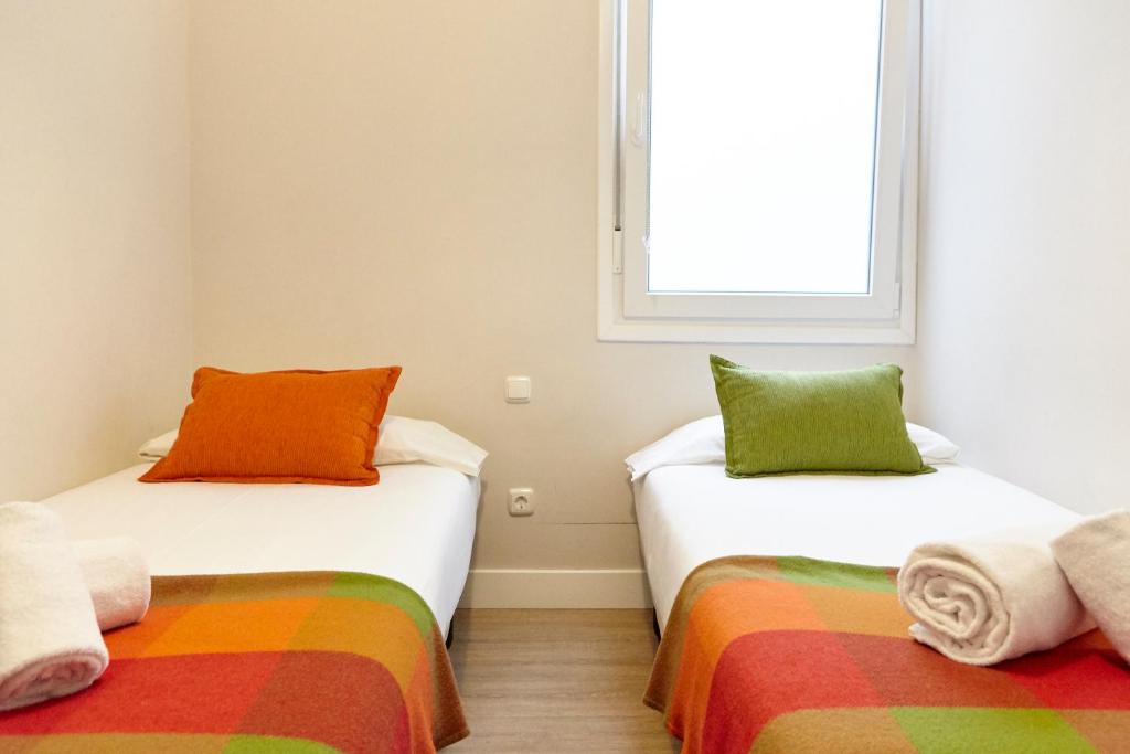 Posteľ alebo postele v izbe v ubytovaní Miramon Apartment by BasqueHomes