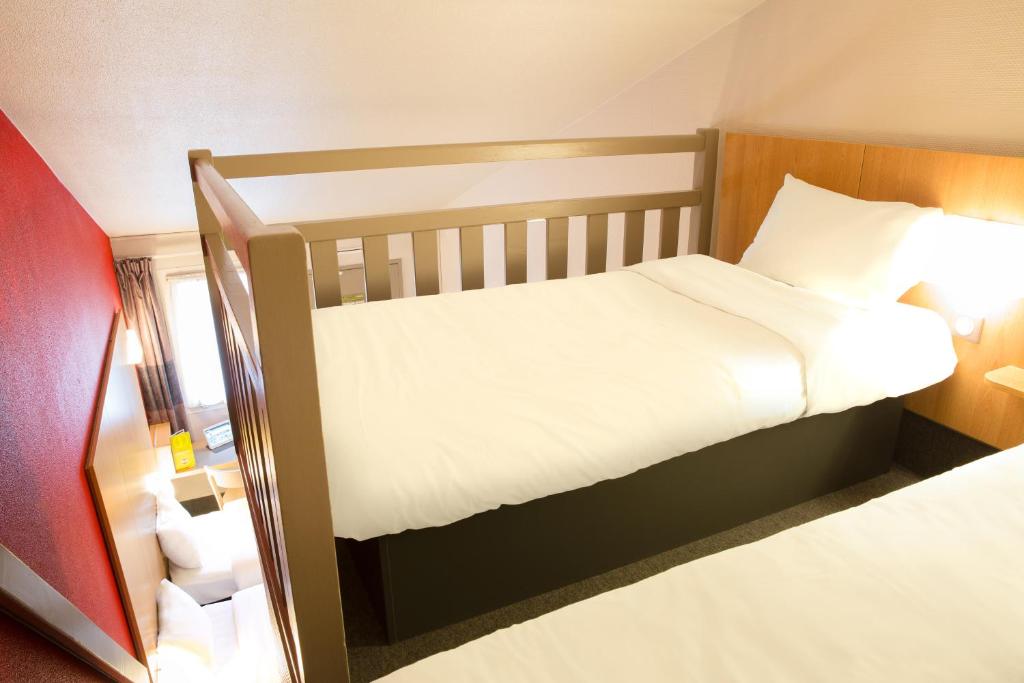 Postel nebo postele na pokoji v ubytování B&B HOTEL Montpellier 2