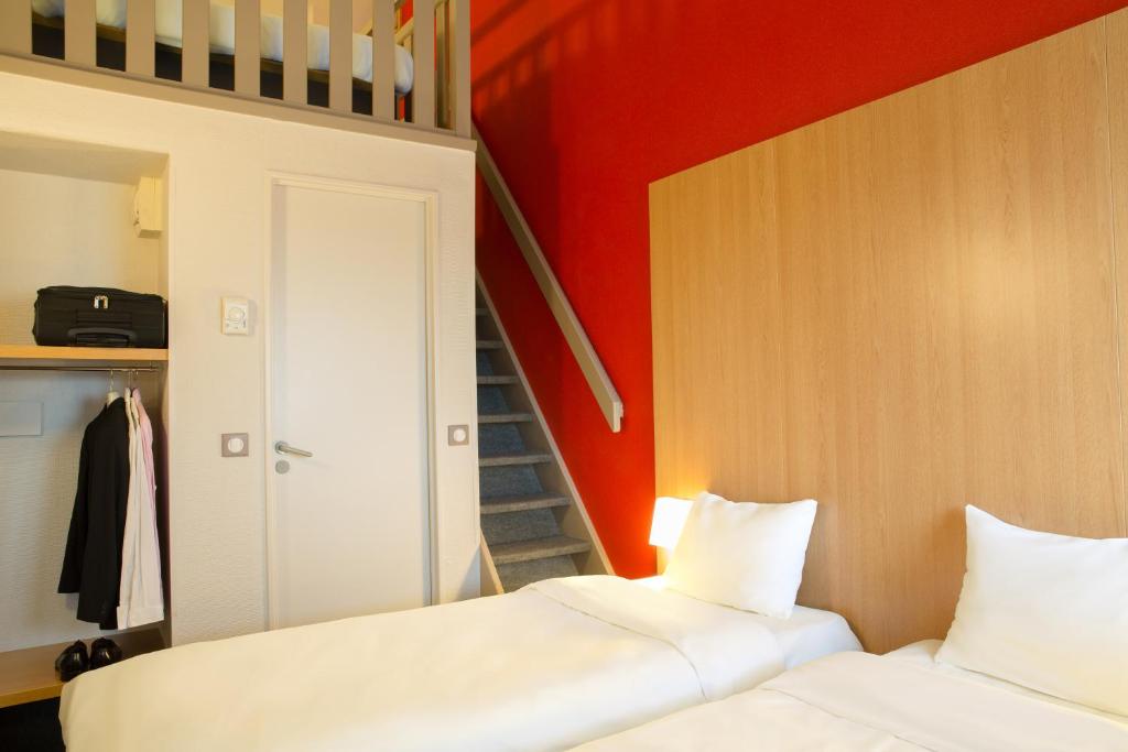 Postel nebo postele na pokoji v ubytování B&B HOTEL Montpellier 2