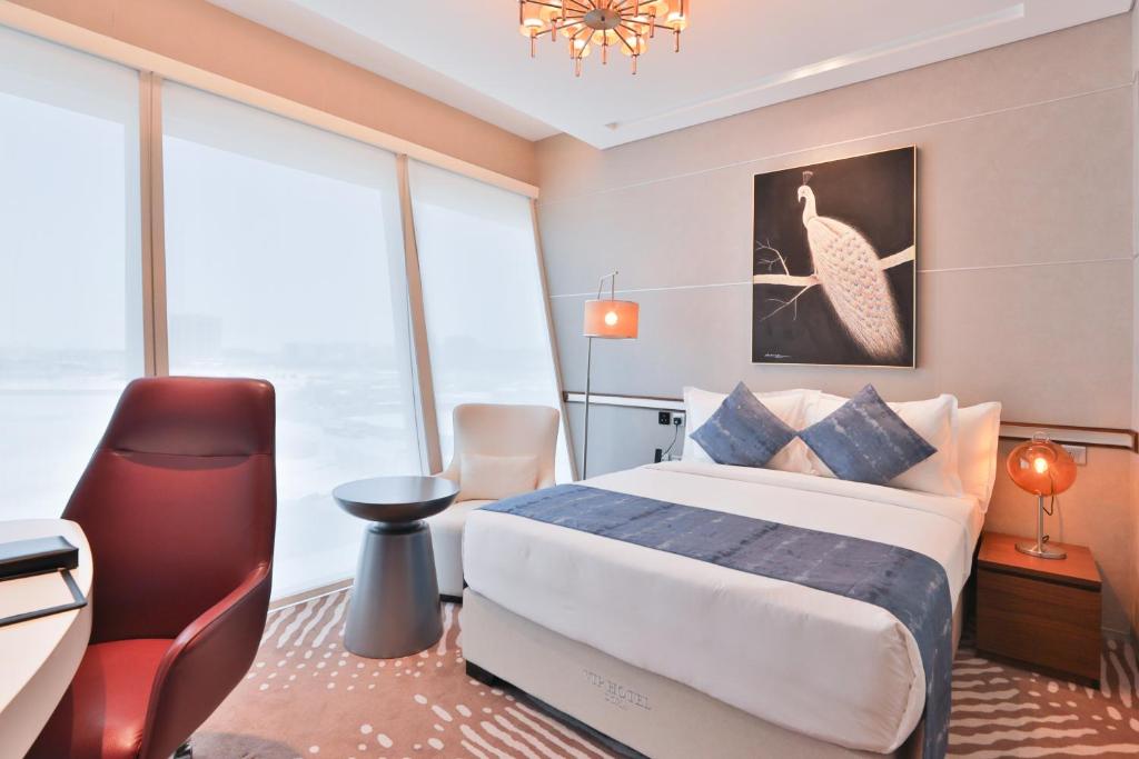 Letto o letti in una camera di VIP Hotel Doha Qatar