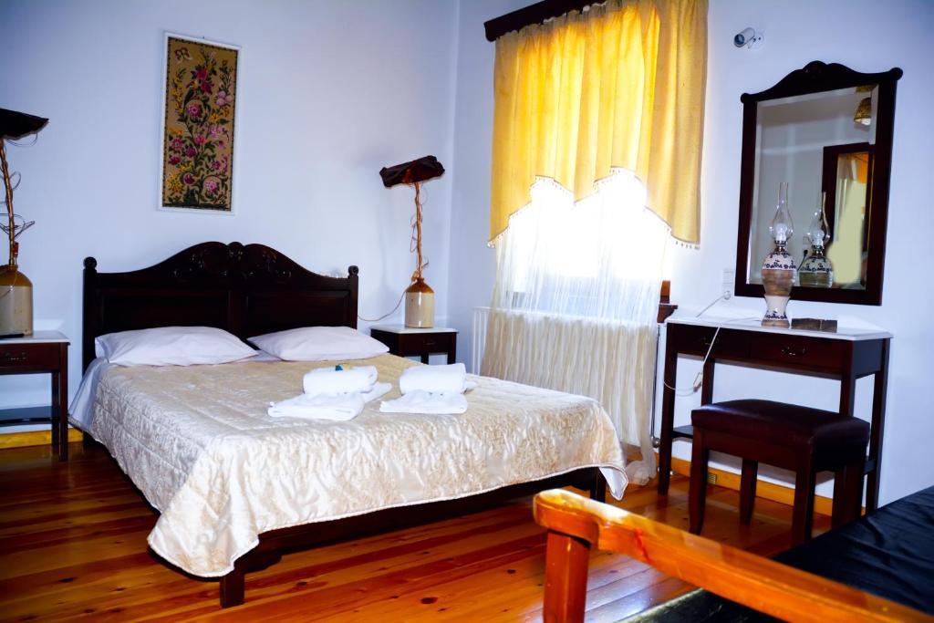 Postel nebo postele na pokoji v ubytování Hotel Adam