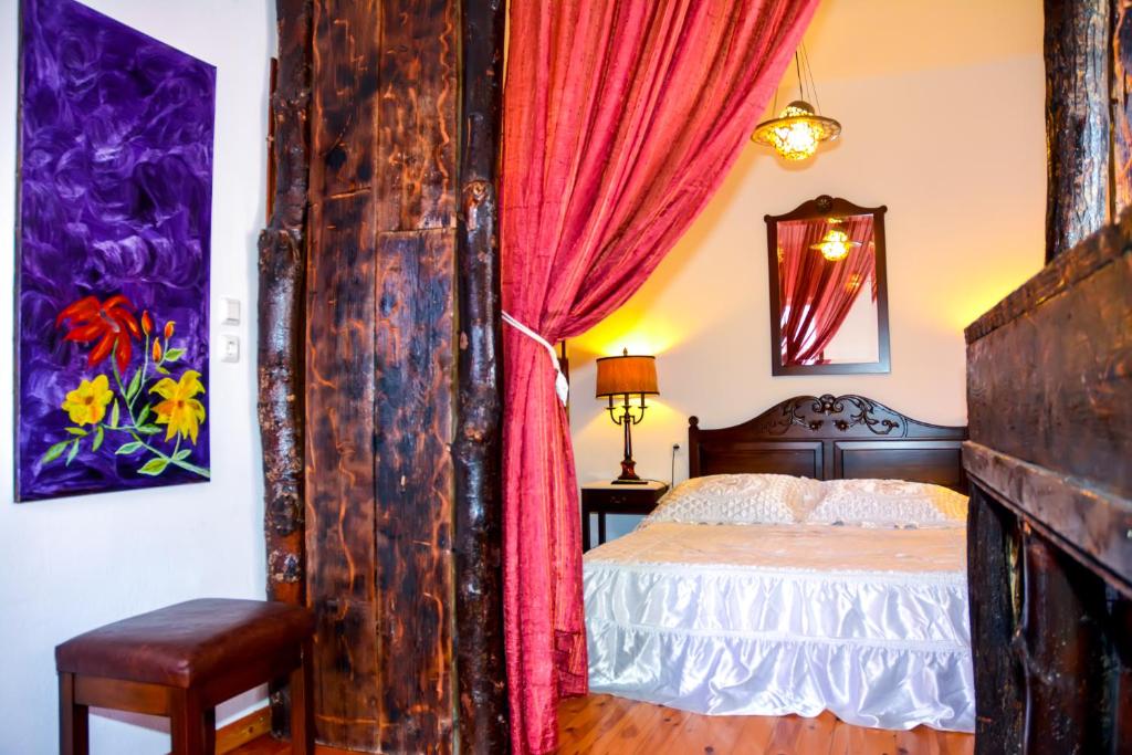 Postel nebo postele na pokoji v ubytování Hotel Adam