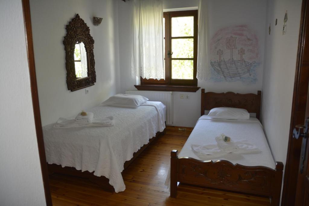 Postel nebo postele na pokoji v ubytování Hotel Adam