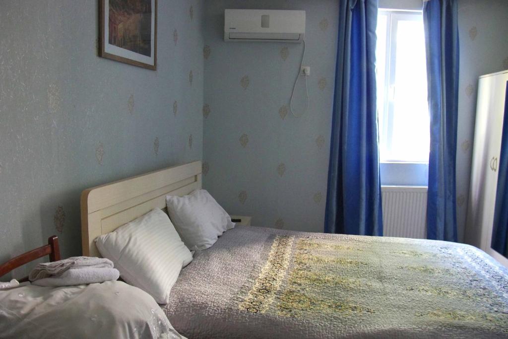Postel nebo postele na pokoji v ubytování Hotel Shalimar