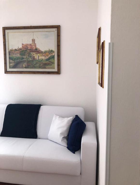 Łóżko lub łóżka w pokoju w obiekcie Residenza Elaya La Maddalena
