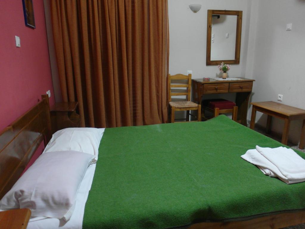 Voodi või voodid majutusasutuse Hotel Alexandrion toas