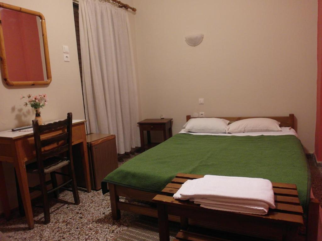 Voodi või voodid majutusasutuse Hotel Alexandrion toas