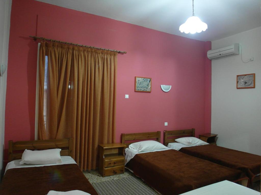 Voodi või voodid majutusasutuse Hotel Alexandrion toas