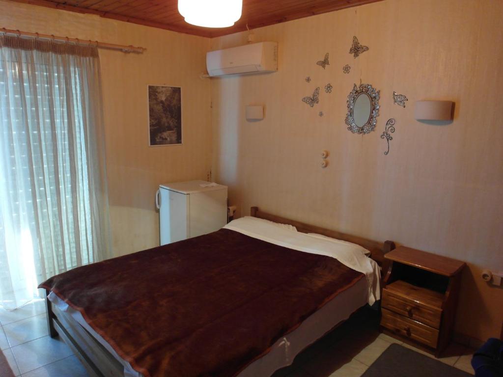 Voodi või voodid majutusasutuse Hotel Alexandrion toas