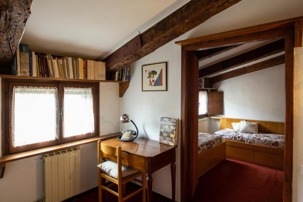 Posteľ alebo postele v izbe v ubytovaní Piazza San Marco - Cozy and warm apartment