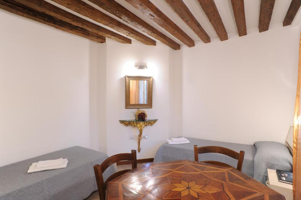 Posedenie v ubytovaní APPARTAMENTO PARADISO CA' GIULIA