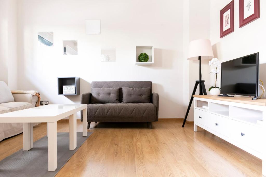 Telewizja i/lub zestaw kina domowego w obiekcie Apartamento Málaga Litoral Beach