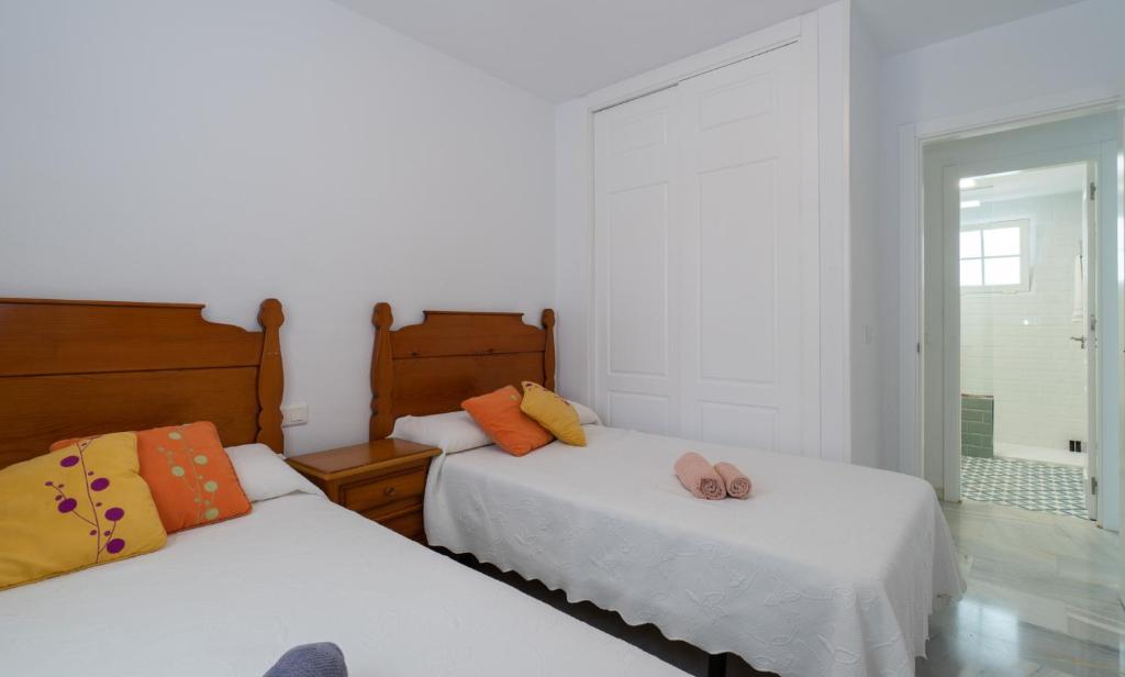 Postel nebo postele na pokoji v ubytování Holidays & Homes I Benalmádena Playa, piscinas ,relax