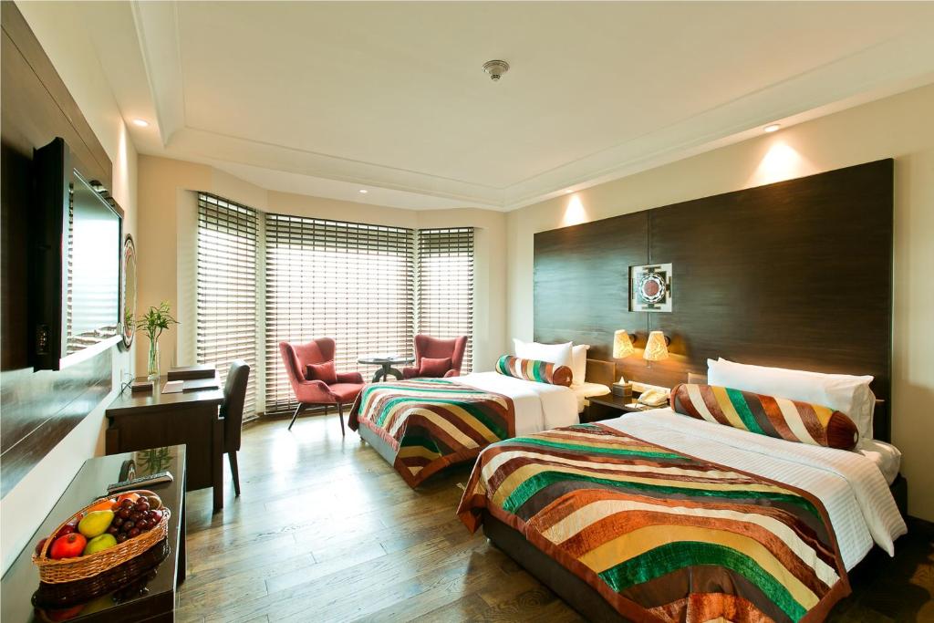 Katil atau katil-katil dalam bilik di The Lalit Jaipur