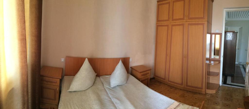 Postel nebo postele na pokoji v ubytování Guest House Lilia