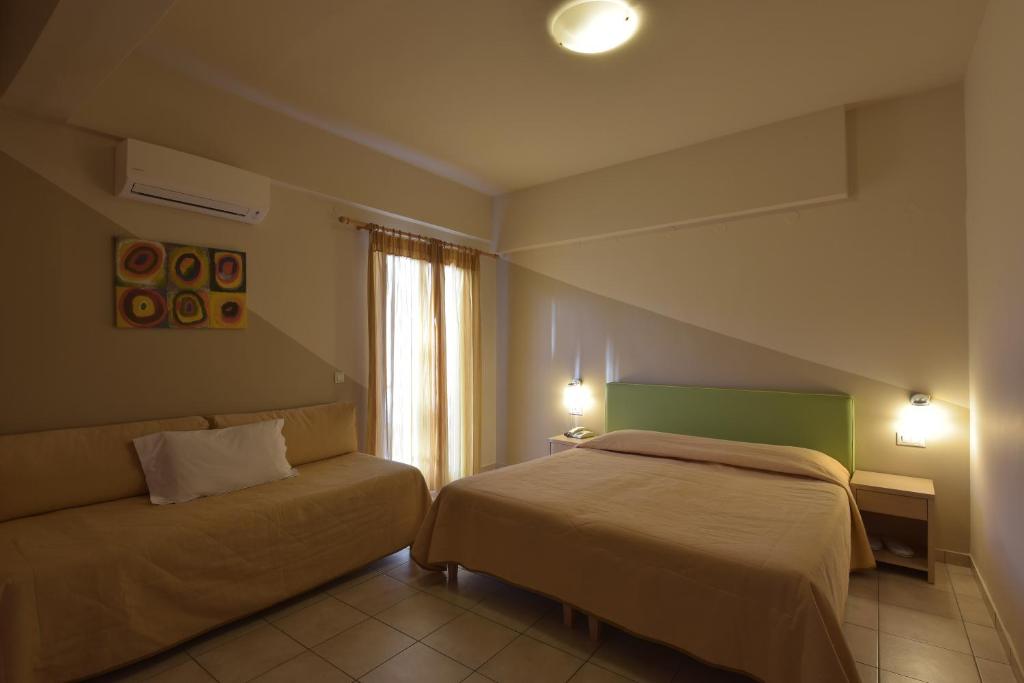 Postel nebo postele na pokoji v ubytování Park Hotel