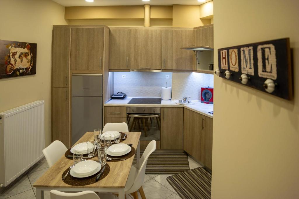 Kuchyň nebo kuchyňský kout v ubytování First View Apartment