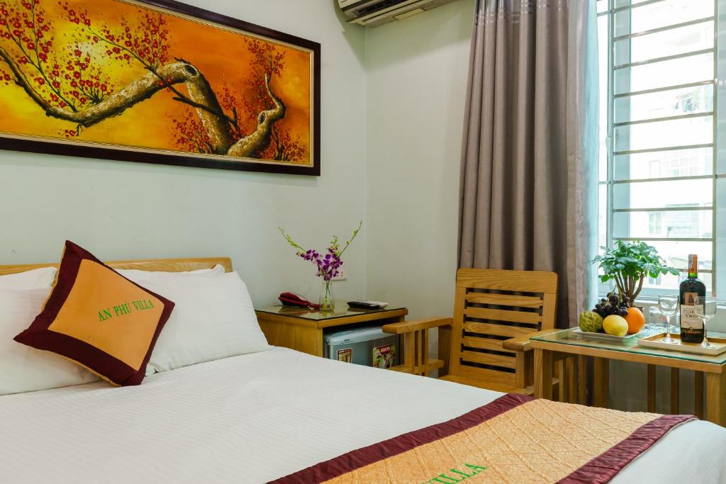 Postel nebo postele na pokoji v ubytování An Phú Hà Nội Hotel & Spa - Mỹ Đình