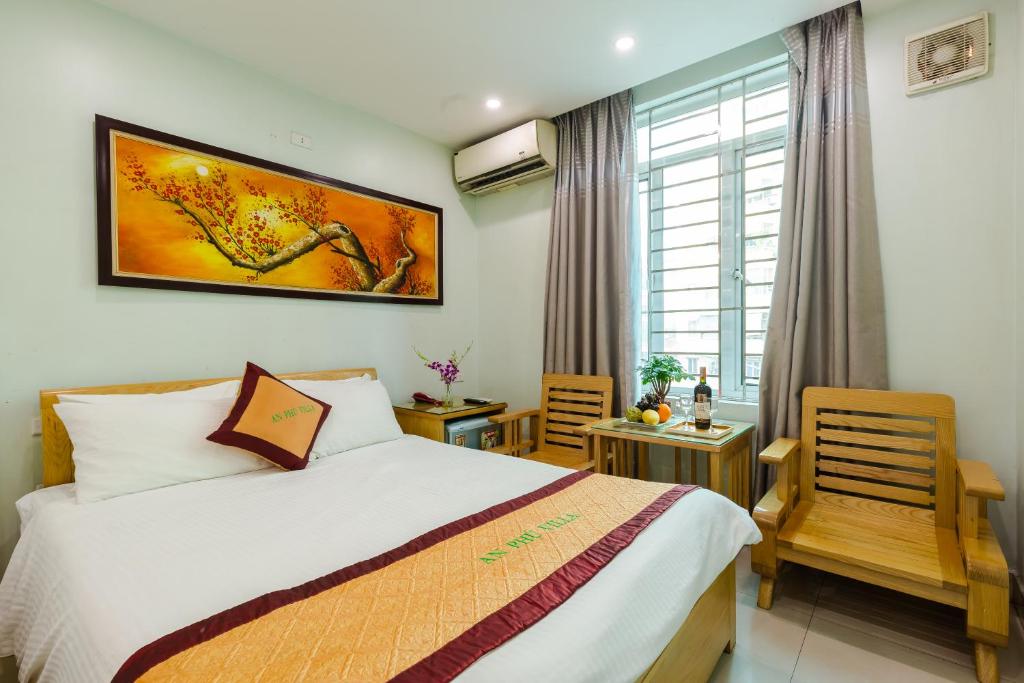 Postel nebo postele na pokoji v ubytování An Phú Hà Nội Hotel & Spa - Mỹ Đình