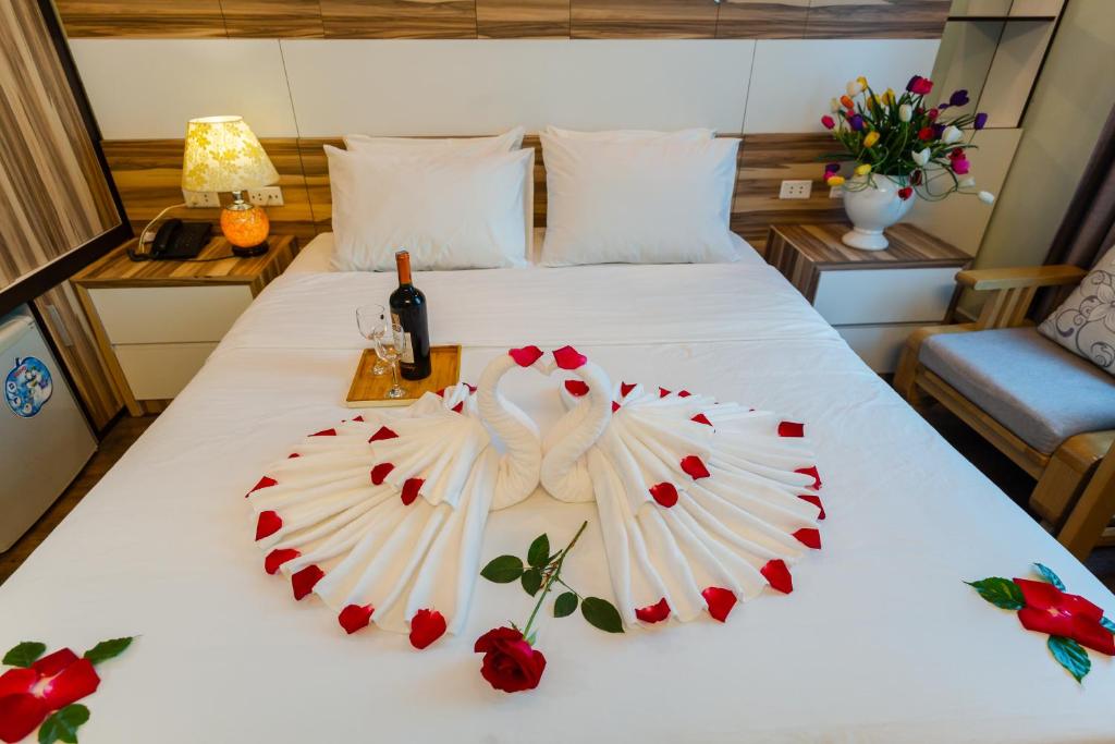 Postel nebo postele na pokoji v ubytování An Phú Hà Nội Hotel & Spa - Mỹ Đình