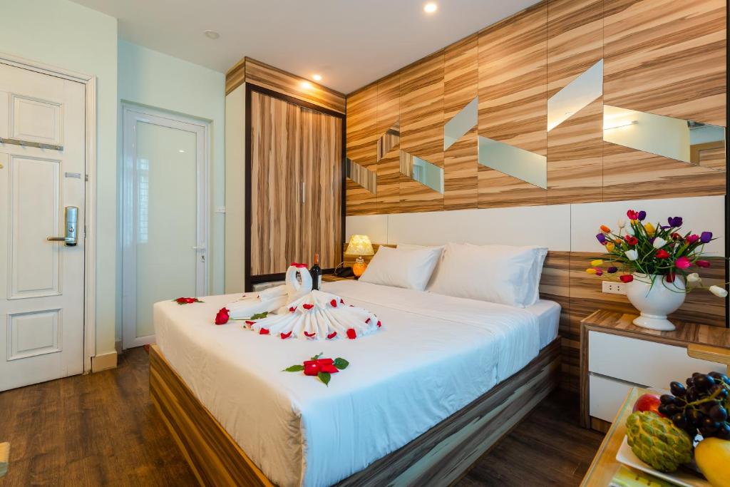 Postel nebo postele na pokoji v ubytování An Phú Hà Nội Hotel & Spa - Mỹ Đình