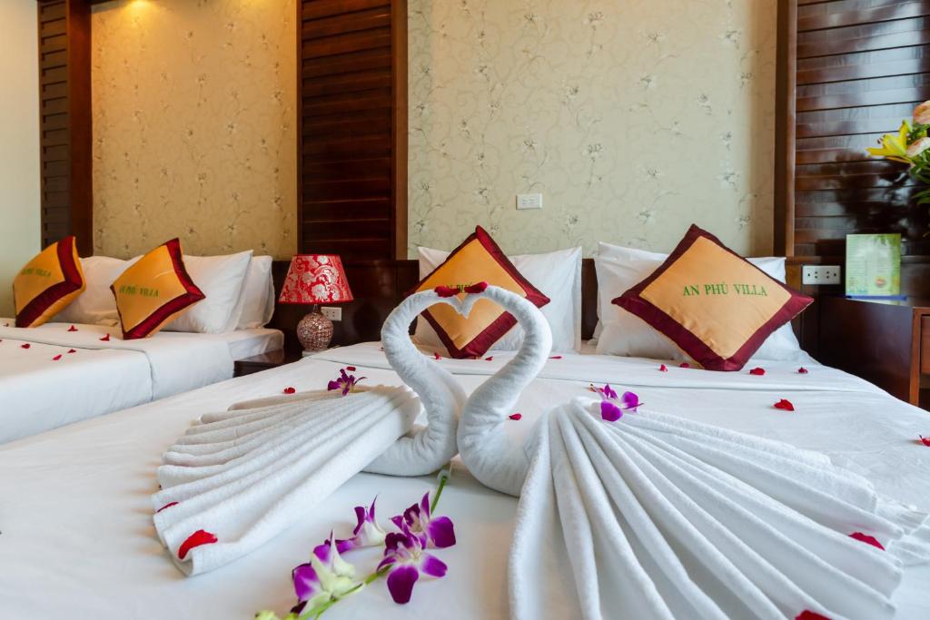 Postel nebo postele na pokoji v ubytování An Phú Hà Nội Hotel & Spa - Mỹ Đình