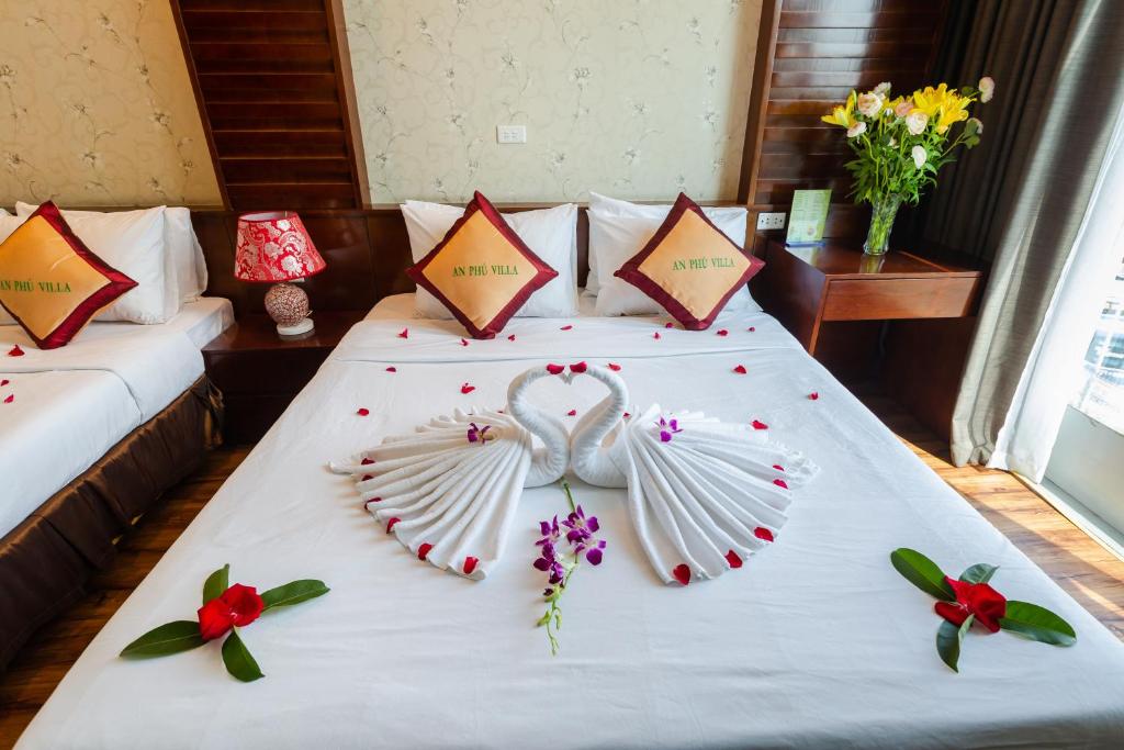Postel nebo postele na pokoji v ubytování An Phú Hà Nội Hotel & Spa - Mỹ Đình