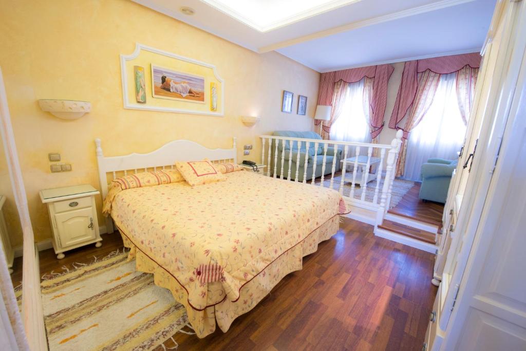 Postel nebo postele na pokoji v ubytování Los Arcos
