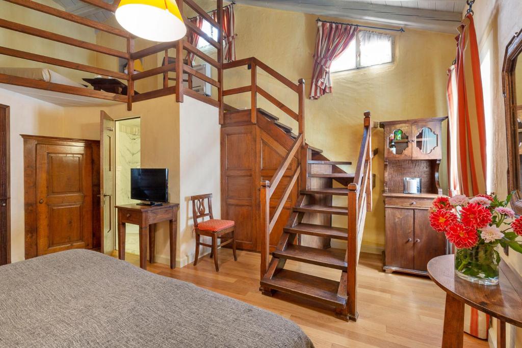 TV a/nebo společenská místnost v ubytování Hotel Pironi