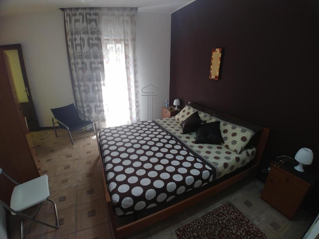 Postel nebo postele na pokoji v ubytování planet rooms