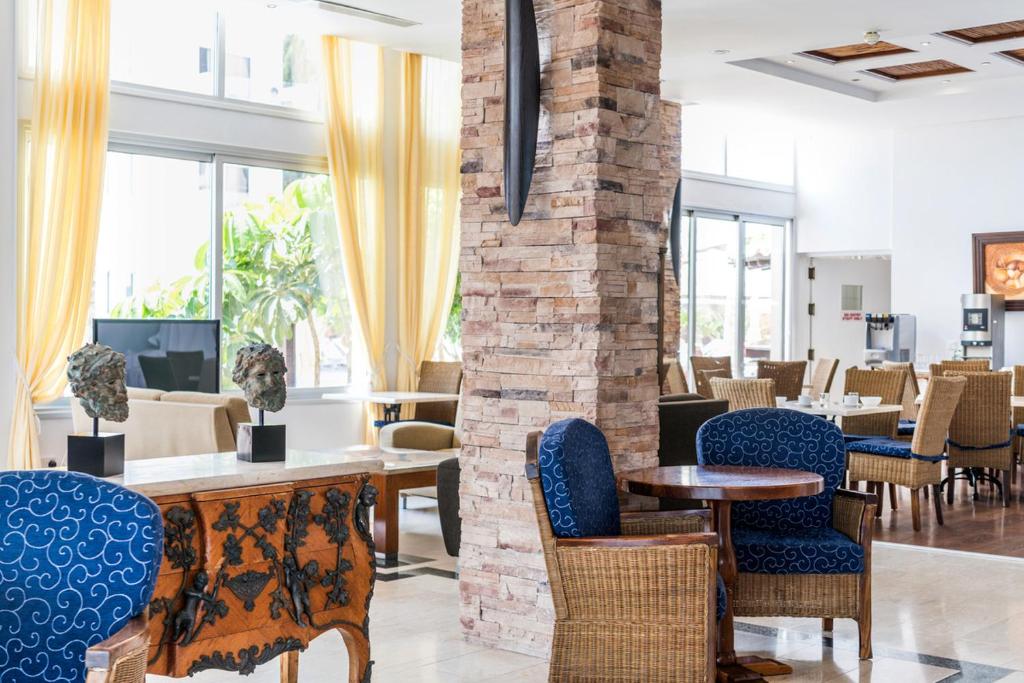 TV a/nebo společenská místnost v ubytování Alva Hotel Apartments