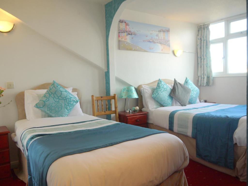 Giường trong phòng chung tại Kilbrannan Guest House