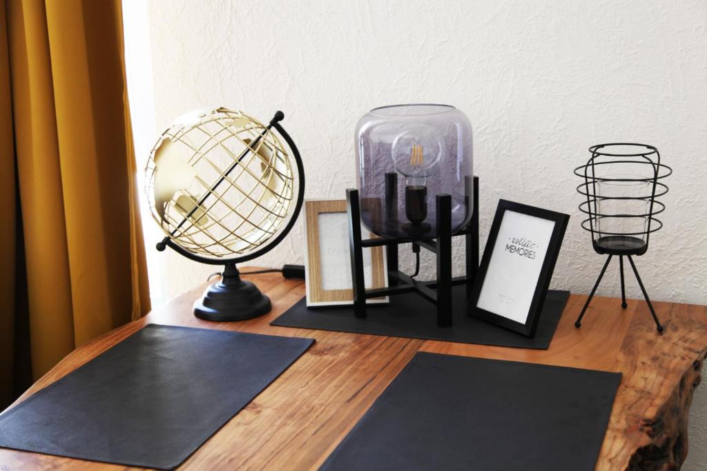 a room with a fan and other items on a table at Apartment am Rhein in Wesseling